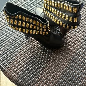 Black leather booties by Betsy Johnson good condition.